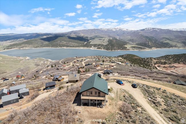 Bird's eye view with a water and mountain view | Image 25
