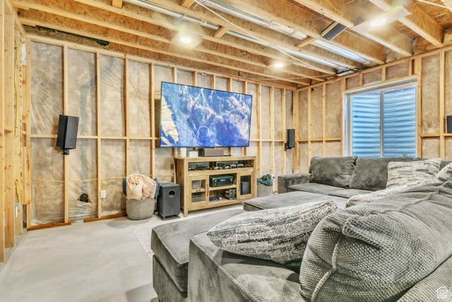 Living room with concrete floors | Image 27