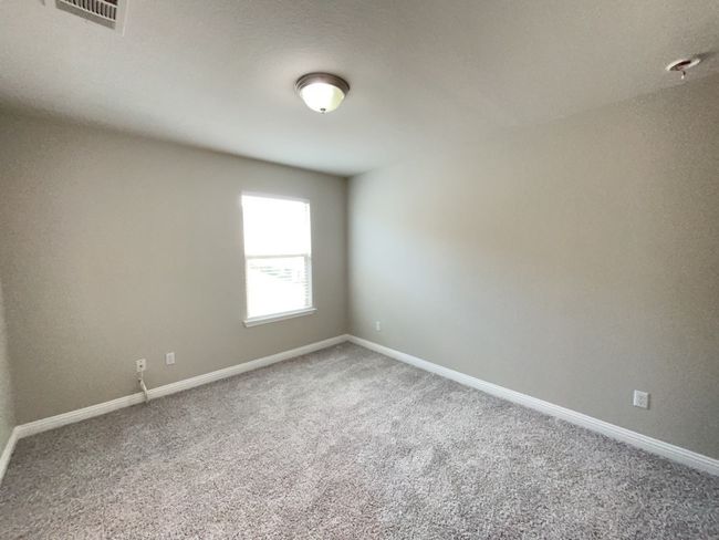 Bed room featuring carpet and baseboards | Image 19