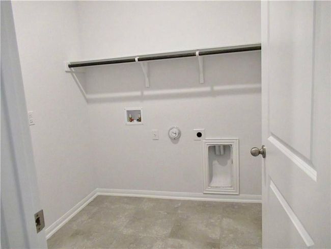 Laundry area with hookup for a gas dryer, hookup for a washing machine, and electric dryer hookup | Image 14