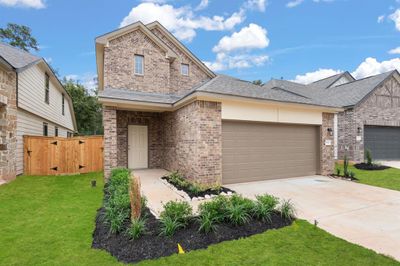 Welcome home to 9364 Hard Rock Road located in the community of Stonebrooke zoned to Conroe ISD. | Image 1