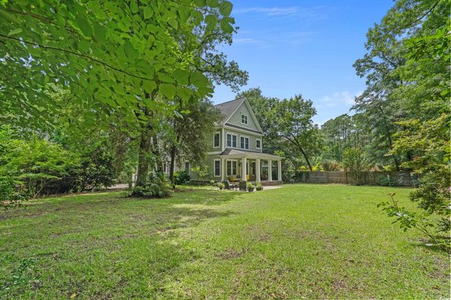 Fenced backyard with a sunroom | Image 22