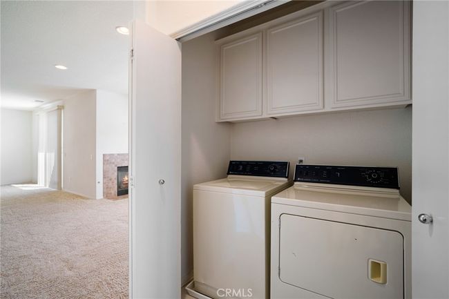 Inside laundry w/full side by side washer and dryer | Image 11