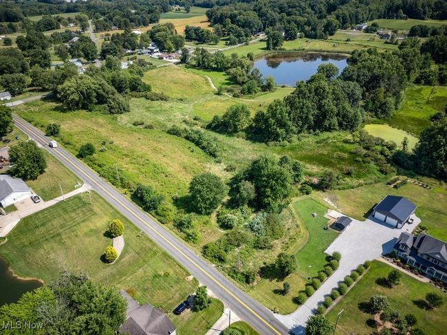 Bird's eye view featuring a water view | Image 14