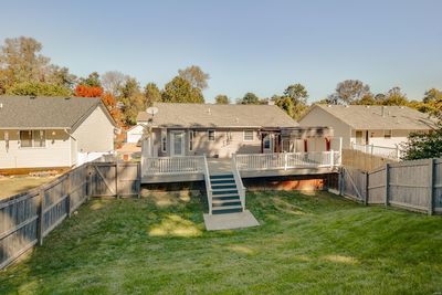 Back of house with a yard and a deck | Image 3