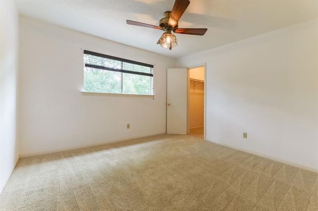 Three large guest bedrooms located upstairs | Image 30