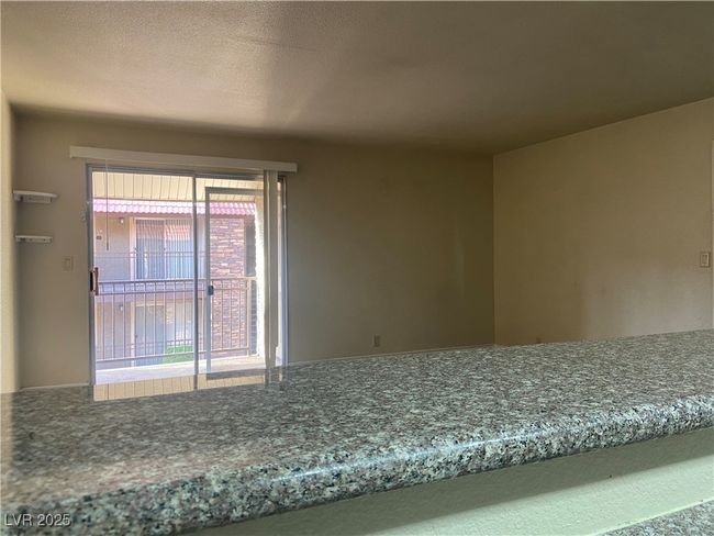 Spare room with a textured ceiling | Image 10