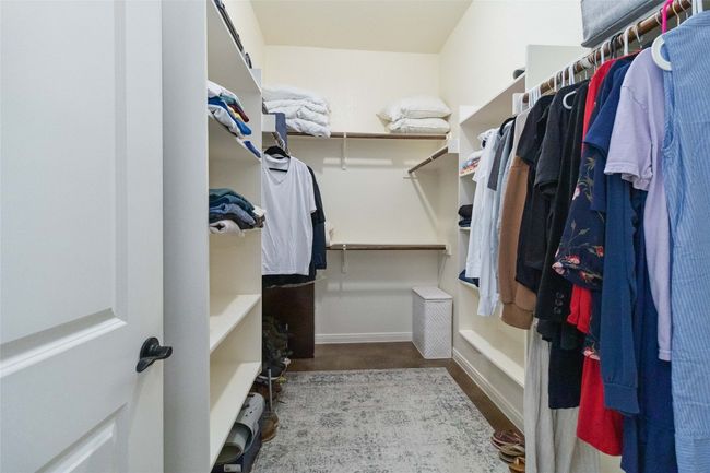 View of spacious closet | Image 23