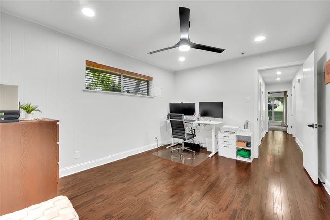 Office space featuring wood finished floors, ceiling fan, and recessed lighting | Image 34