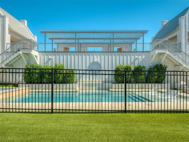 View of swimming pool featuring stairs | Image 43