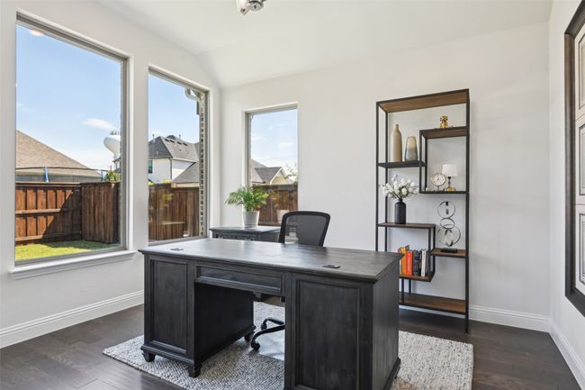 Home office with dark wood-style flooring and vaulted ceiling | Image 28