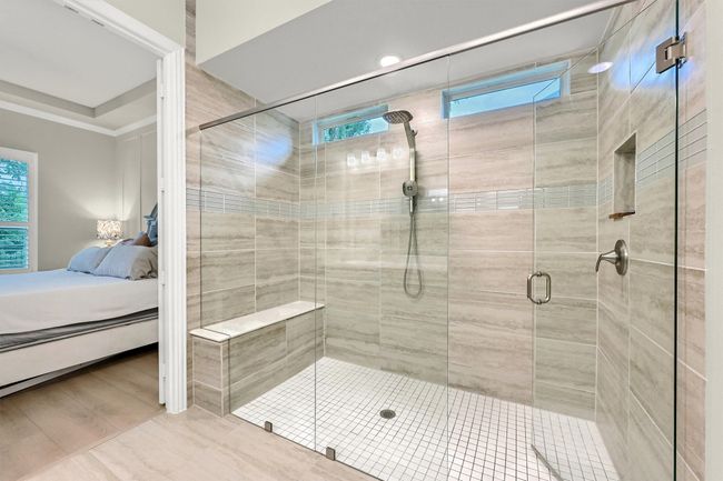 Bathroom with a stall shower and ensuite bathroom | Image 20