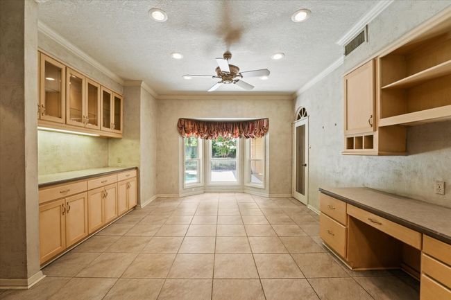 storage and study/office area off of kitchen | Image 11