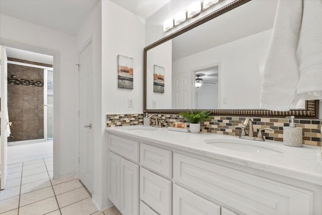 Upstairs vainty 2- located off hall and connected to shower/tub | Image 25