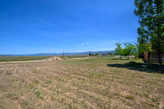 View of yard featuring a view of rural / pastoral area and a mountain view | Image 40