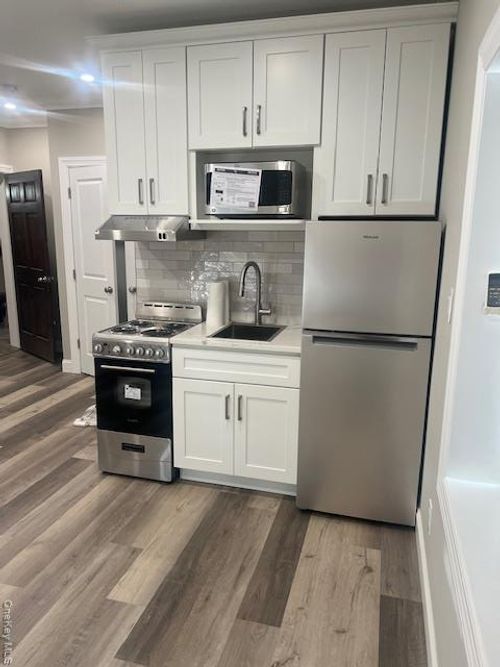 5720 Old Sunrise Hwy, Massapequa, NY, 11758-5540 | Card Image