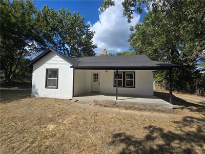 Ranch-style house with a patio area | Image 1