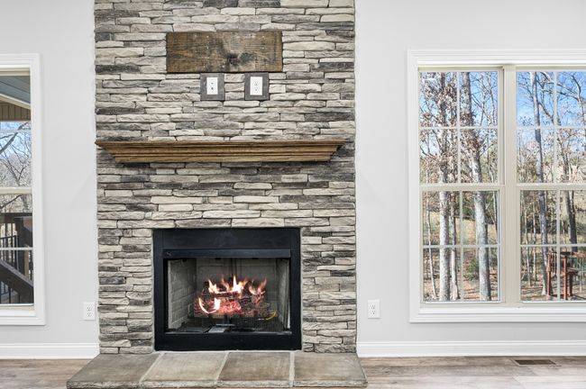 Stone fireplace and TONS of natural light in the family room | Image 26
