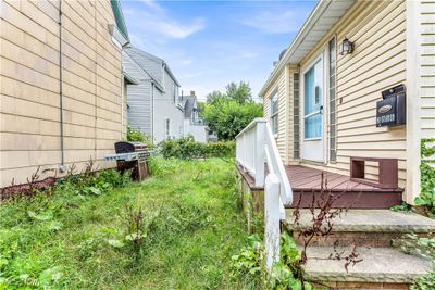 View of yard featuring a deck | Image 3