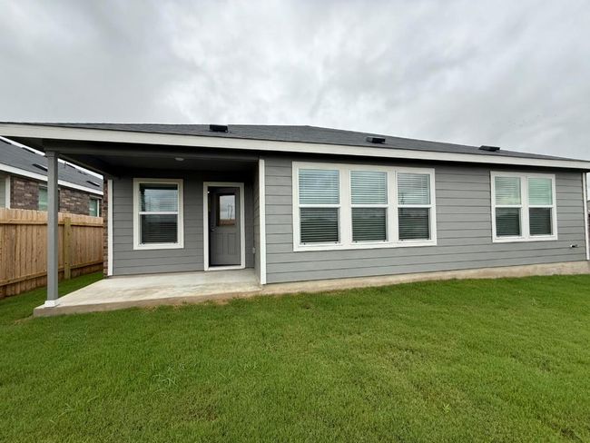 Rear view of house featuring a patio | Image 32