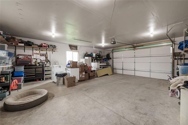 Double attached garage with one level into the house, insulated, sheet rocked and wired for a heater, thermostat is wired in. | Image 17
