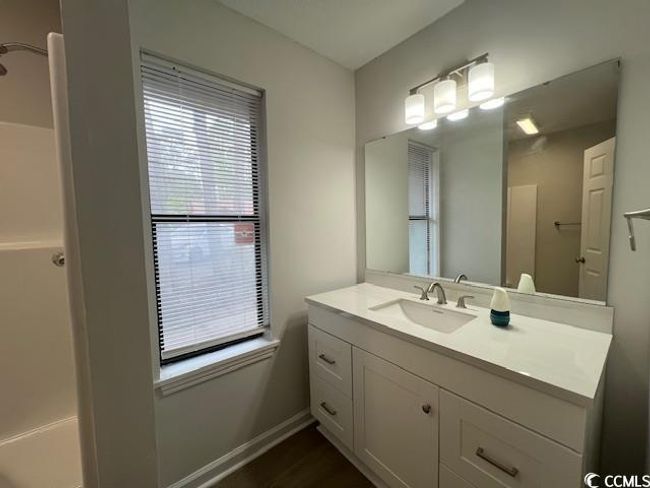 Bathroom with vanity and baseboards | Image 12