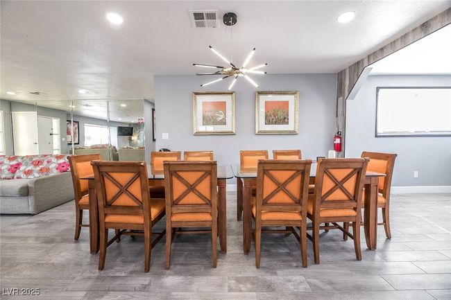 Dining room with recessed lighting and baseboards | Image 10