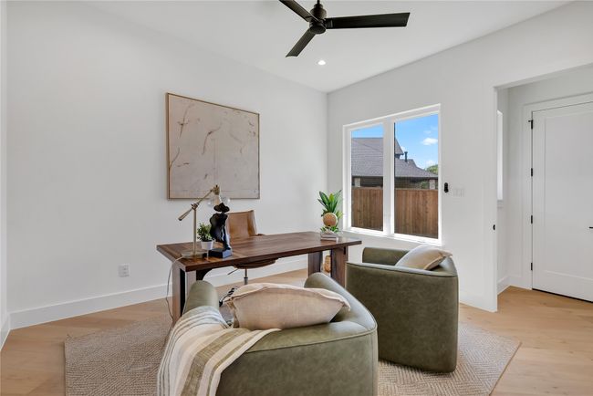 Office area with a ceiling fan, light wood finished floors, and recessed lighting | Image 15