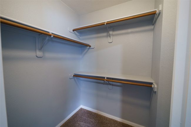 Spacious closet featuring carpet flooring | Image 26