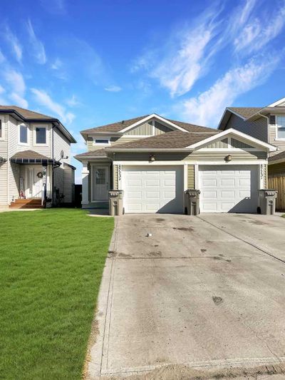 A - 8713 88 St, House other with 2 bedrooms, 1 bathrooms and null parking in Grande Prairie AB | Image 1