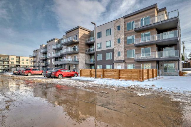 405 - 200 Shawnee Square Sw, Home with 2 bedrooms, 2 bathrooms and 1 parking in Calgary AB | Image 1