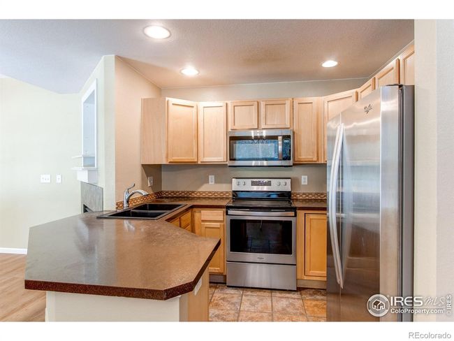 1953 Piney River Dr, Townhouse with 3 bedrooms, 3 bathrooms and 2 parking in Loveland CO | Image 6