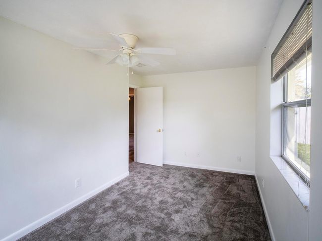 1287 Sw Sunset Trl, House other with 4 bedrooms, 2 bathrooms and null parking in Palm City FL | Image 14