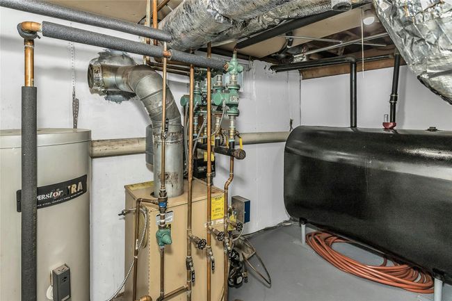 Utility room featuring heating fuel and water heater | Image 34