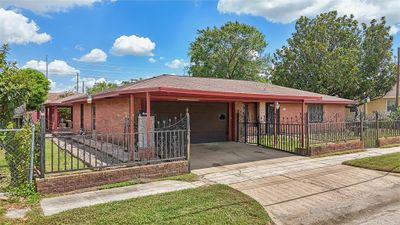 Side view of this Solid Brick Home | Image 2