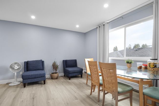 Dining space featuring baseboards, wood finished floors, a baseboard heating unit, and recessed lighting | Image 22