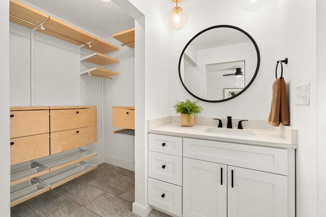 Bathroom featuring vanity and ceiling fan | Image 13