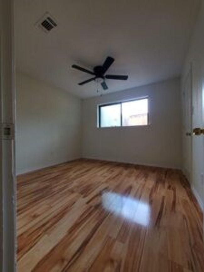 Unfurnished room with wood finished floors | Image 24