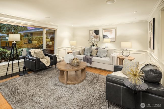 Presenting a spacious living room with plenty of room for a grand piano ... this formal space truly epitomizes the aesthetic of refined sophistication. | Image 4