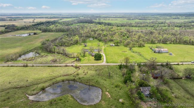 Overview of rural landscape featuring a large body of water | Image 6