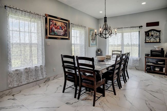 Dining area with lots of natural light! | Image 20