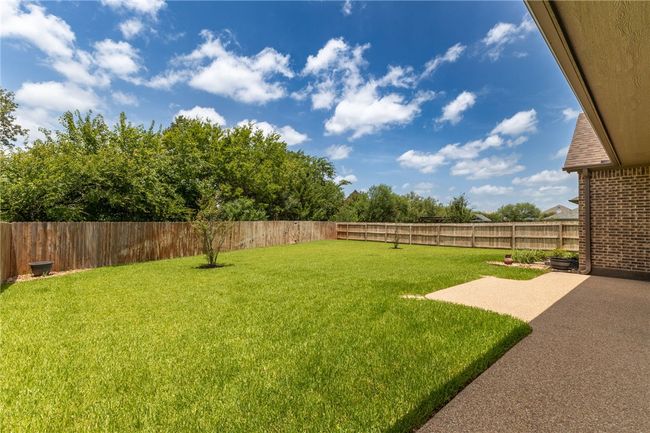 This entertainer’s dream offers ample space and a fully fenced yard, ensuring both privacy and security. | Image 28
