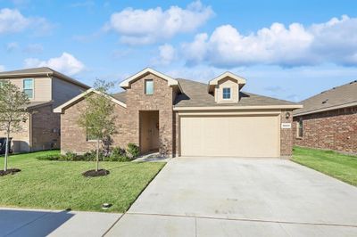 View of front of house with a front lawn and a garage | Image 3