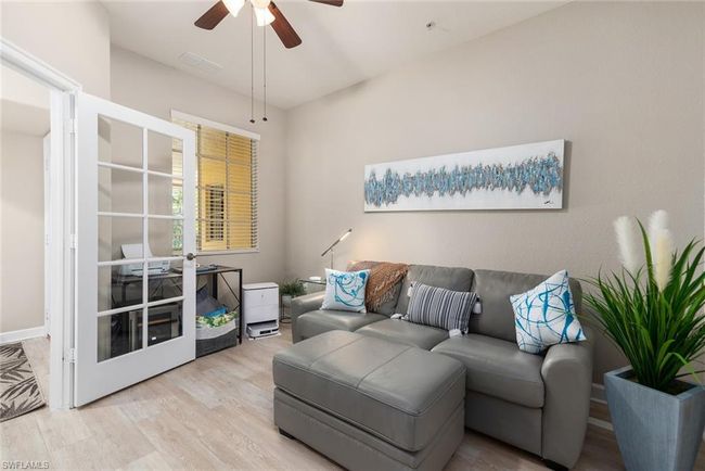 Living room featuring french doors, ceiling fan, and light wood-type flooring | Image 15
