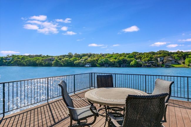 Wooden deck featuring a water view | Image 24