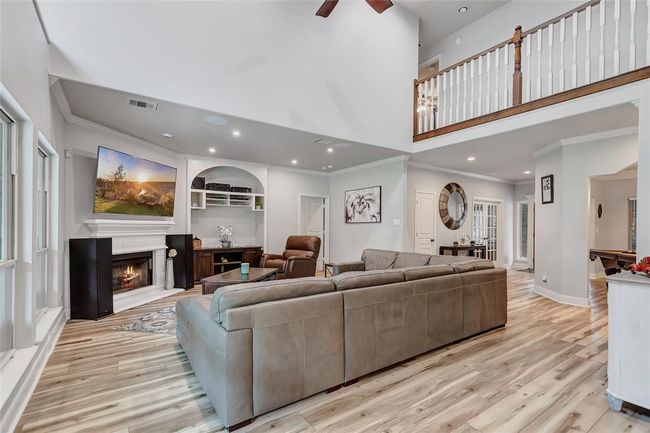 Living Room open to the breakfast area and upstairs with high ceilings and surround sound | Image 14