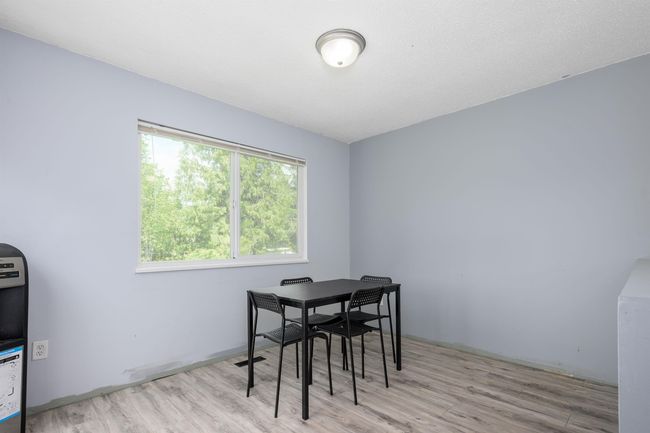 Dining room with wood finished floors | Image 17