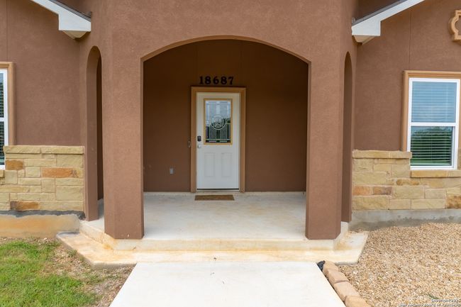 Front covered porch leads to front door | Image 6