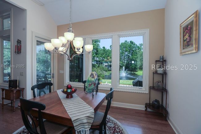 Casual dining area overlooks the gorgeous fountain | Image 24