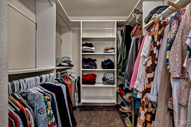 View of walk in closet | Image 7